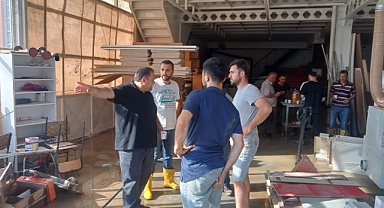 Akdağoğlu, hasar gören işletmeleri ziyaret etti