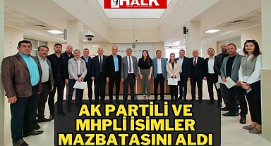 AK Partili ve MHP'li isimler mazbatasını aldı