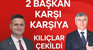 2 başkan karşı karşıya