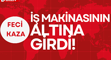 İŞ MAKİNASININ ALTINA GİRDİ!