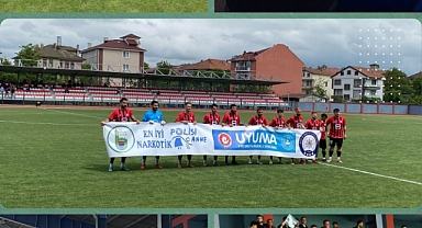 Sporculardan dikkat çeken pankart