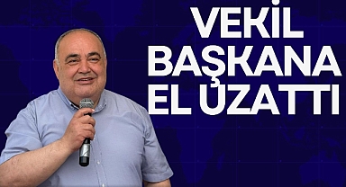VEKİL BAŞKANA EL UZATTI