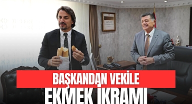 BAŞKANDAN VEKİLE EKMEK İKRAMI